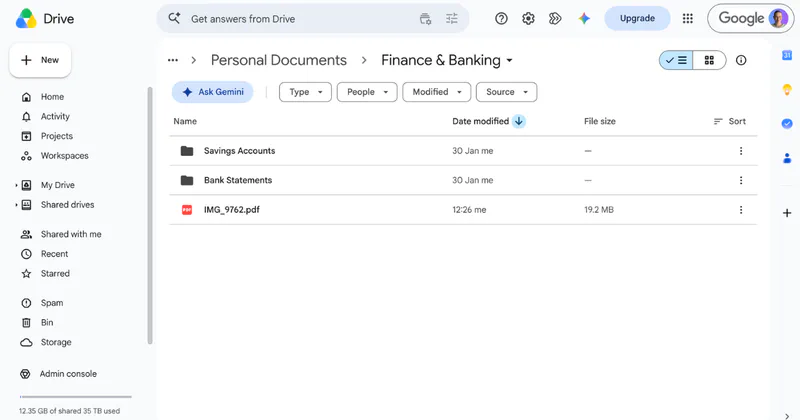 The Finance and Banking folder in Google Drive with the filed document sitting beside two folders, still named IMG_9762.pdf